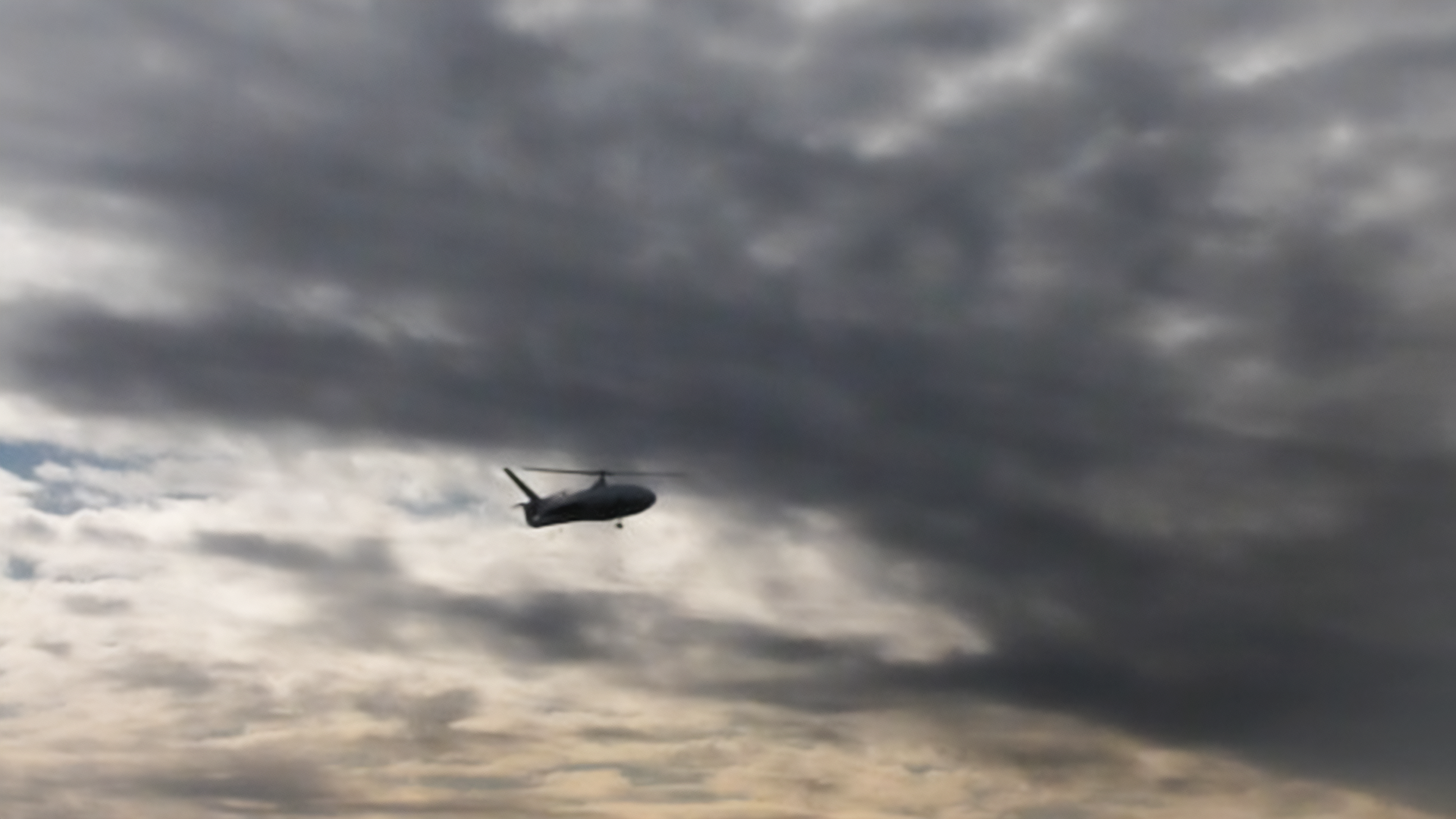 Technicians prepare Vigia 2 MALE UAVs for Argentinian Air Force missions at sunset.